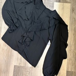 New never worn without tag.  Adorable lightweight/sheer ruffled button up blouse